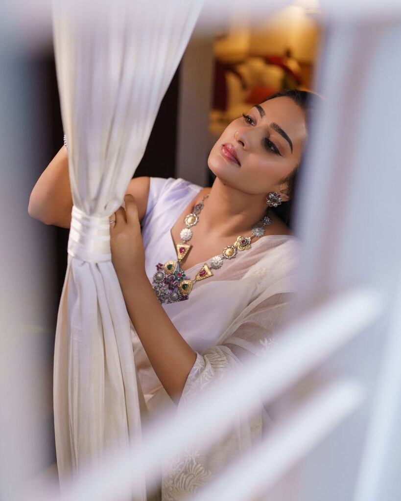 Aditi Ravi Dazzling in Traditional White Saree