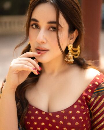 Aditi Budhathoki Looks Stunning in Red Lehenga