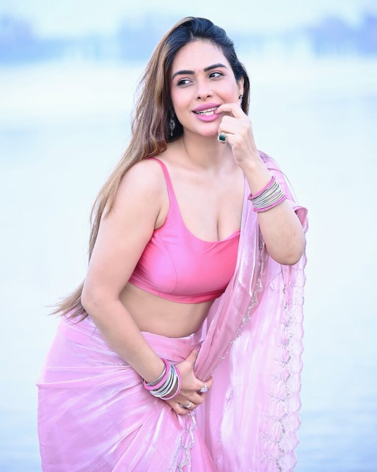 Neha Malik Mesmerizes Fans with Her Sultry Saree Photos