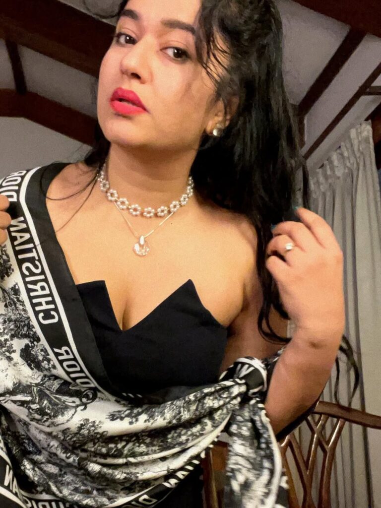 Poonam Bajwa Stuns in Strapless Blouse and Black Saree Combo