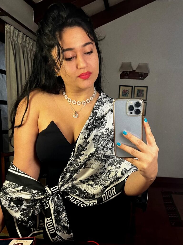 Poonam Bajwa Stuns in Strapless Blouse and Black Saree Combo