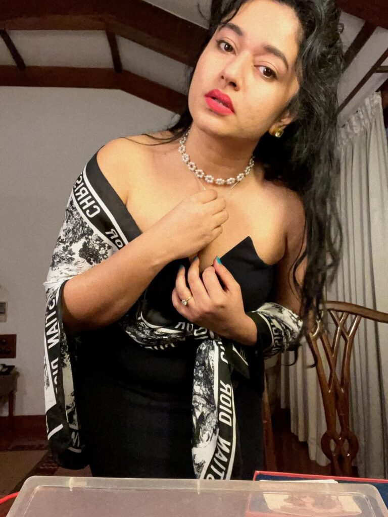 Poonam Bajwa Stuns in Strapless Blouse and Black Saree Combo